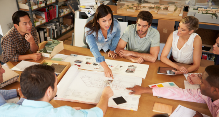 Leading a team of building contractors under the direction of a female leader
